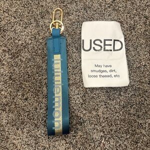 Used blue lululemon keychain
